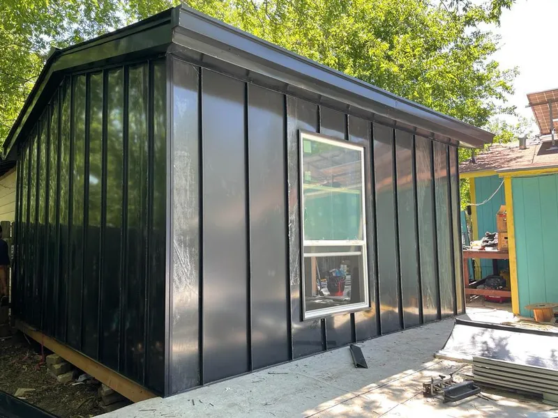Black standing seam metal wall panels for Roof Inspection in South Sioux City